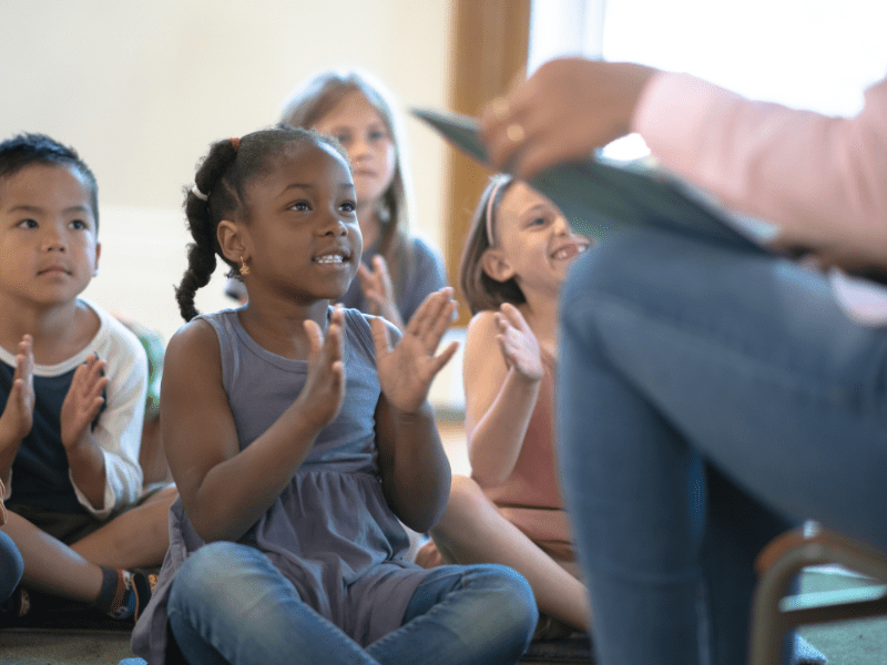 Teacher Reading to Students