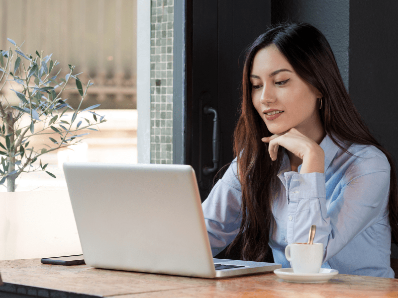 Woman Reading from Computer